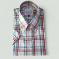 Checked shirt in red, green, blue, and white with a classic collar and branded tag reading “Shirts & Glory – Handmade Shirting.”