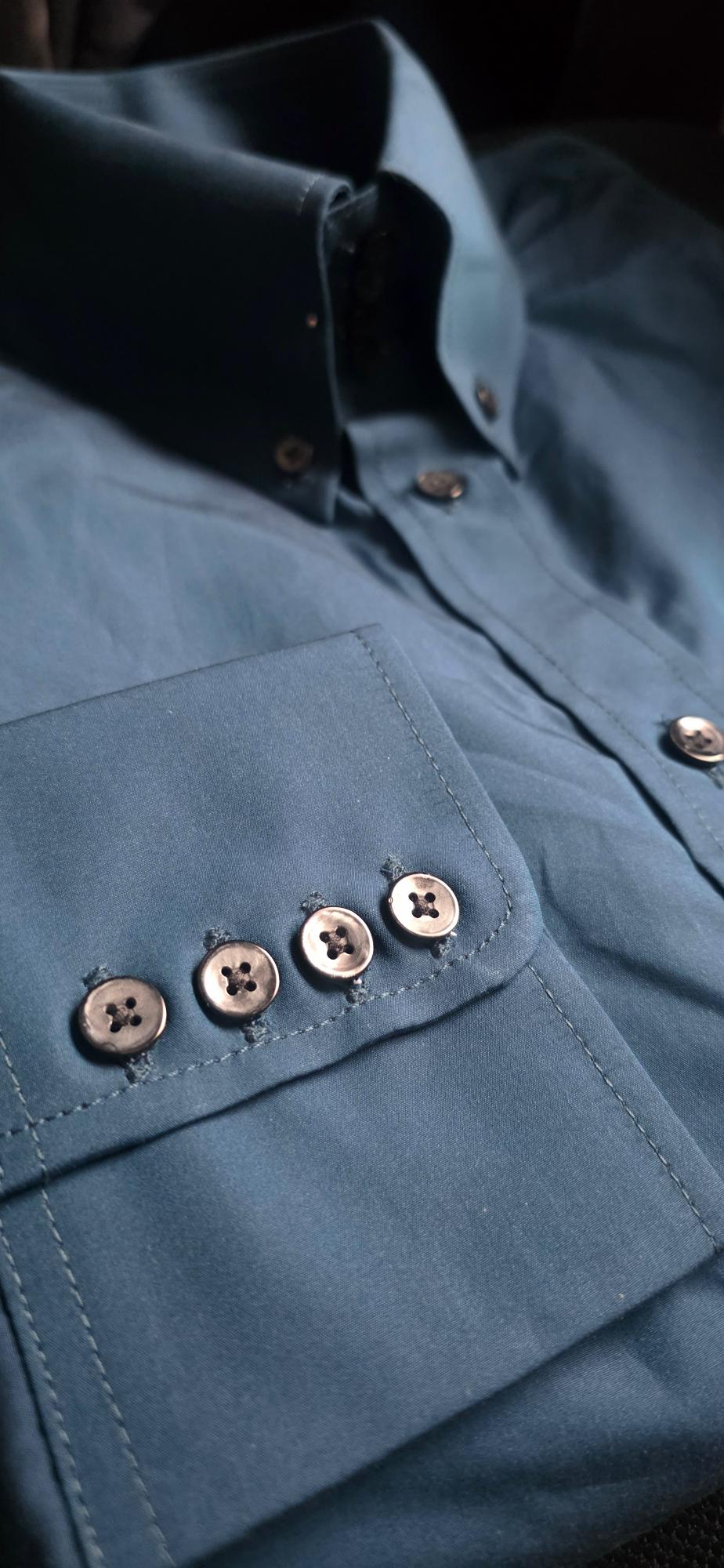 Sterling teal blue shirt — close up of high four-button button-down collar and four-button barrel cuff