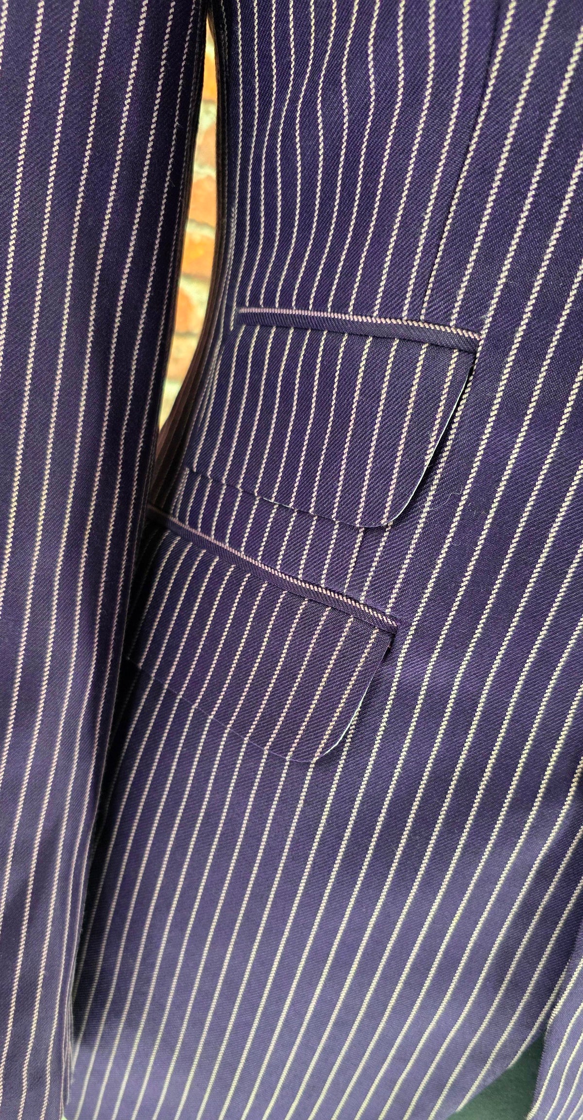 Close-up of the Leith purple pinstripe lapel and ticket pocket
