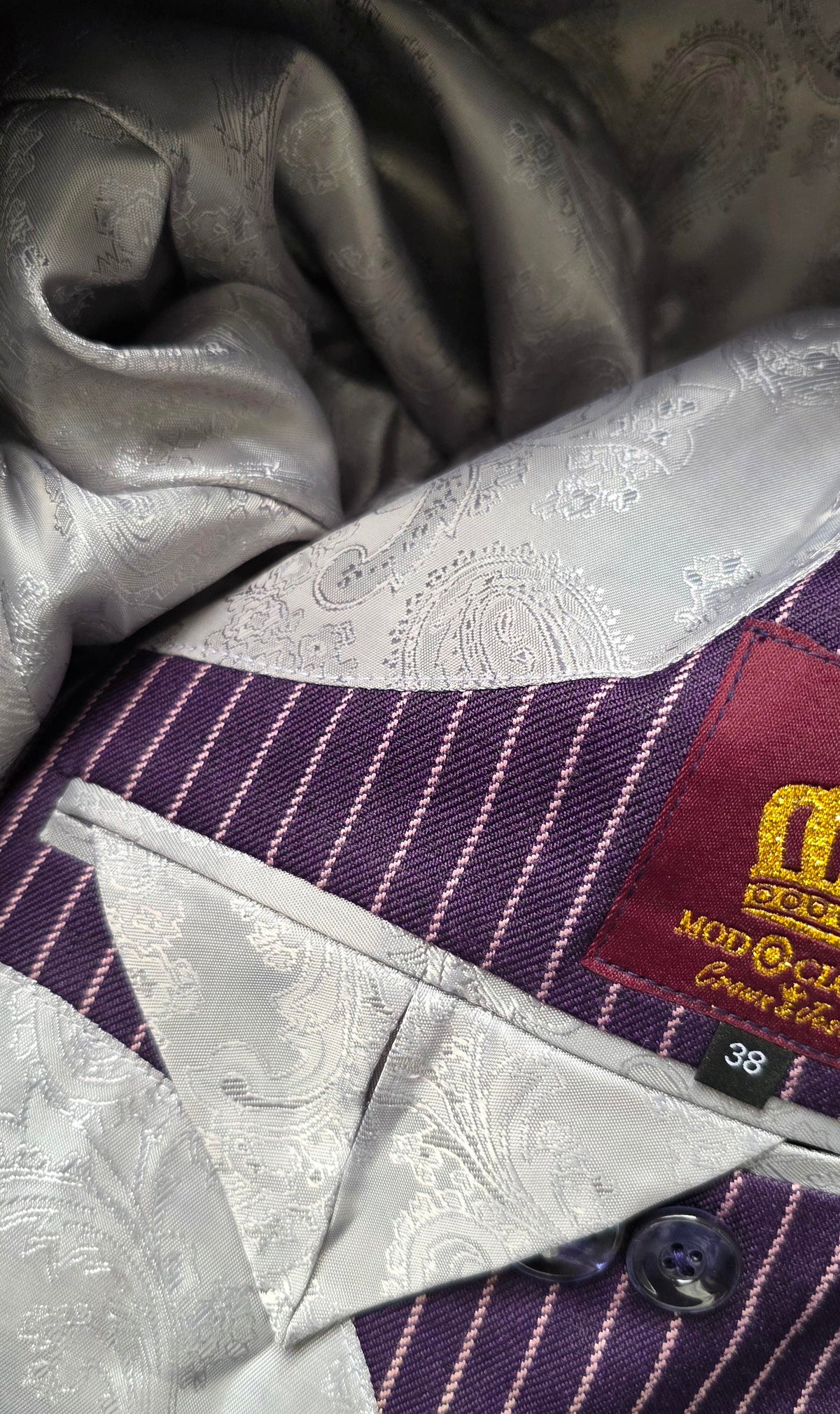 Paisley patterned lining of the Leith purple pinstripe blazer
