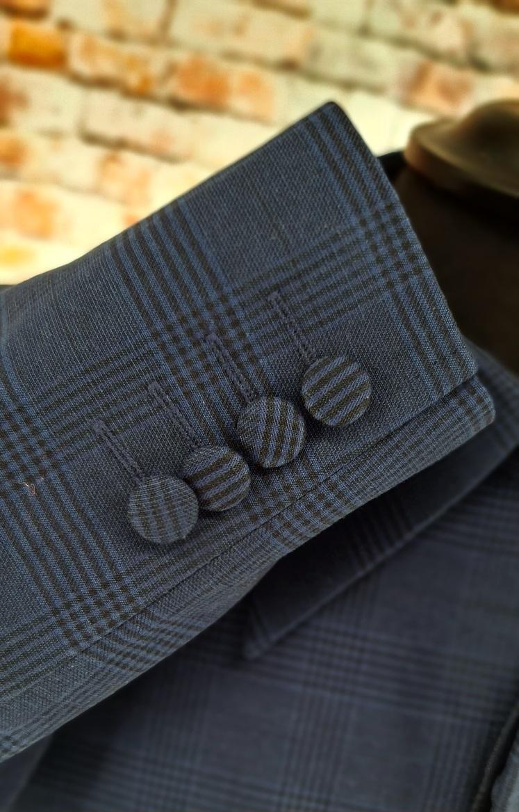 Grant men's Mod navy Prince of Wales check overcoat cuff detail