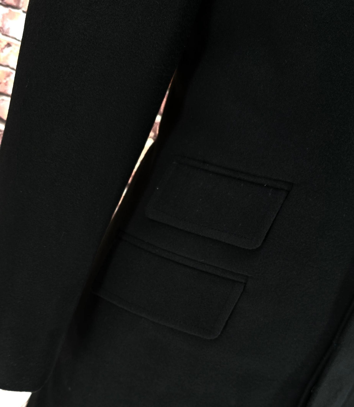 John men's Mod black 3/4 length overcoat with red lining pocket close up