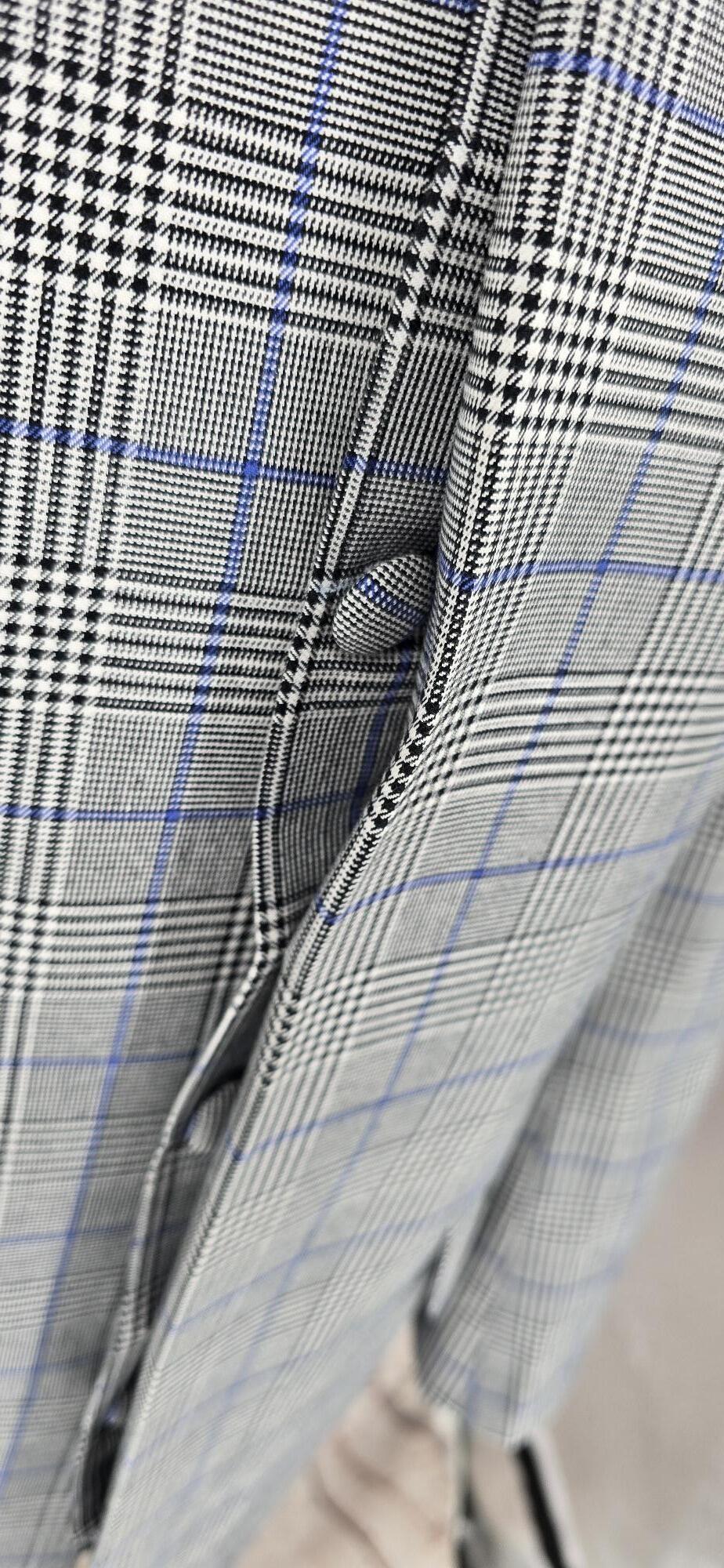 Winchester men's Mod Prince of Wales check overcoat button detail