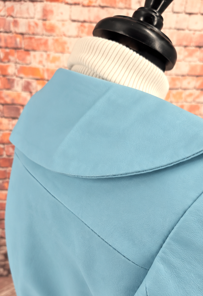 Back detail of Miranda pale blue lambs leather coat showing the rounded collar and shoulder seams