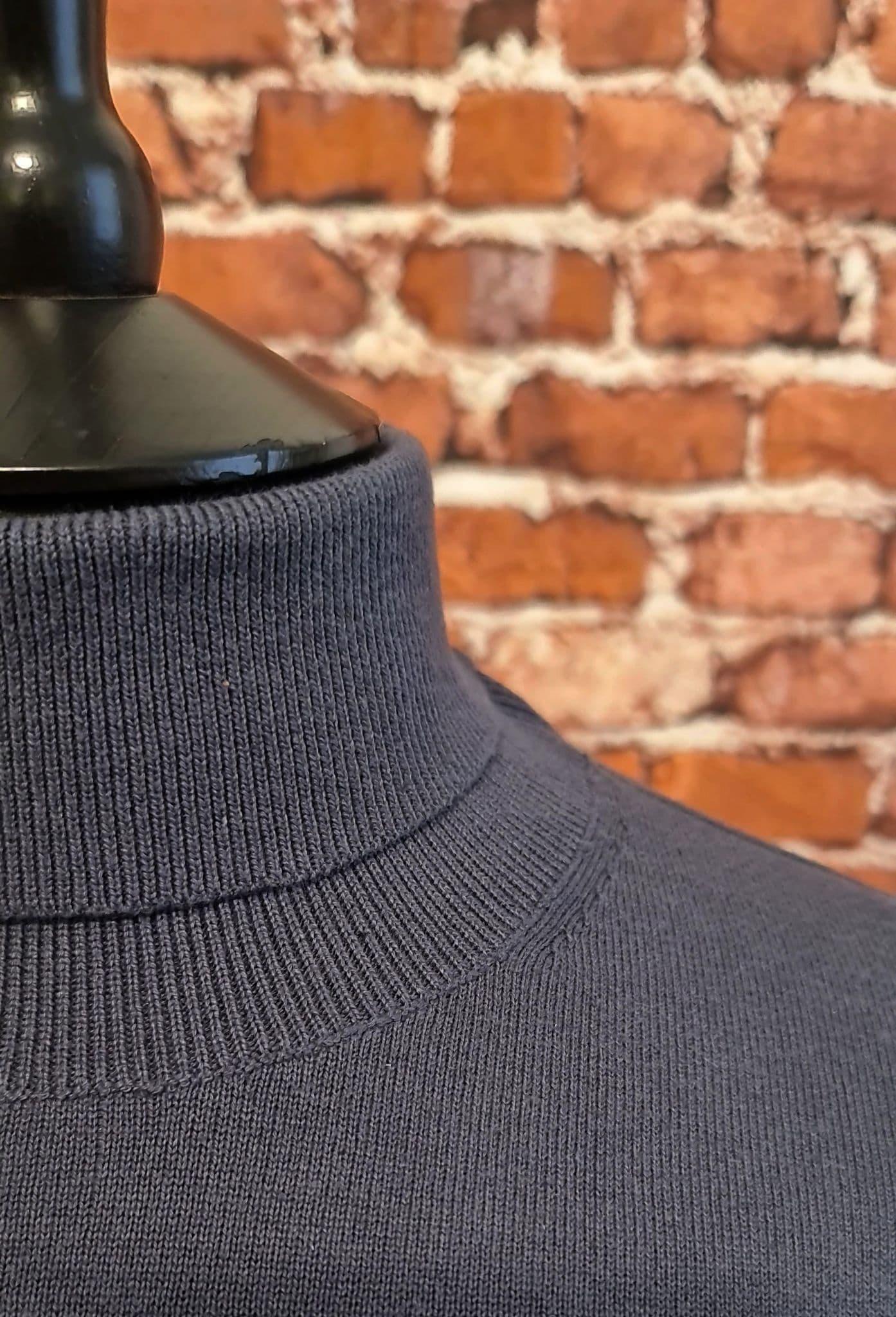 Slate Long Sleeved Roll Neck Jumper.